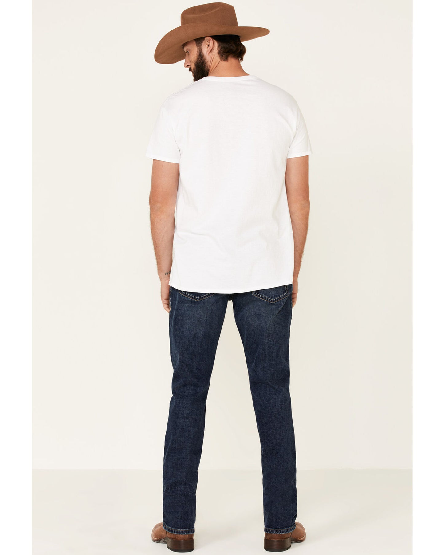 Back of Man Wearing Ariat Men's M4 Denali Malone Dark Stretch Stackable Relaxed Straight Jeans