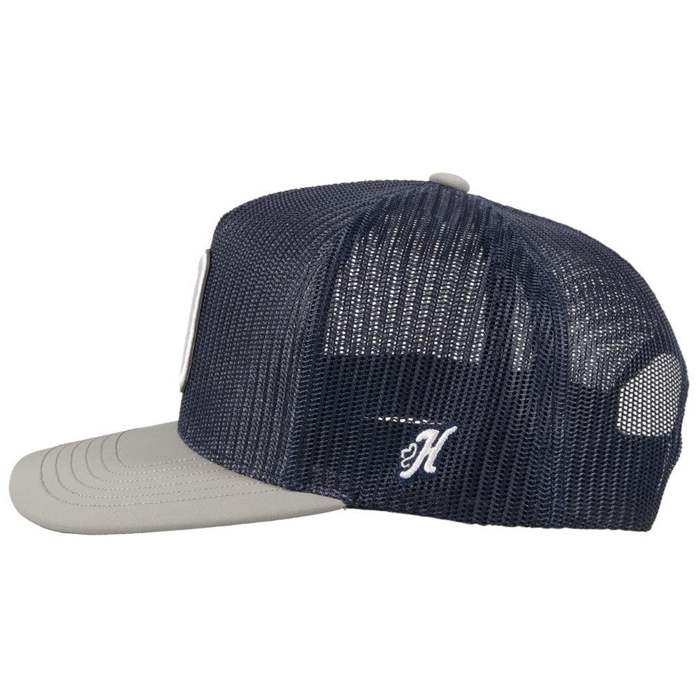 Navy and gray cap with a logo on a white background