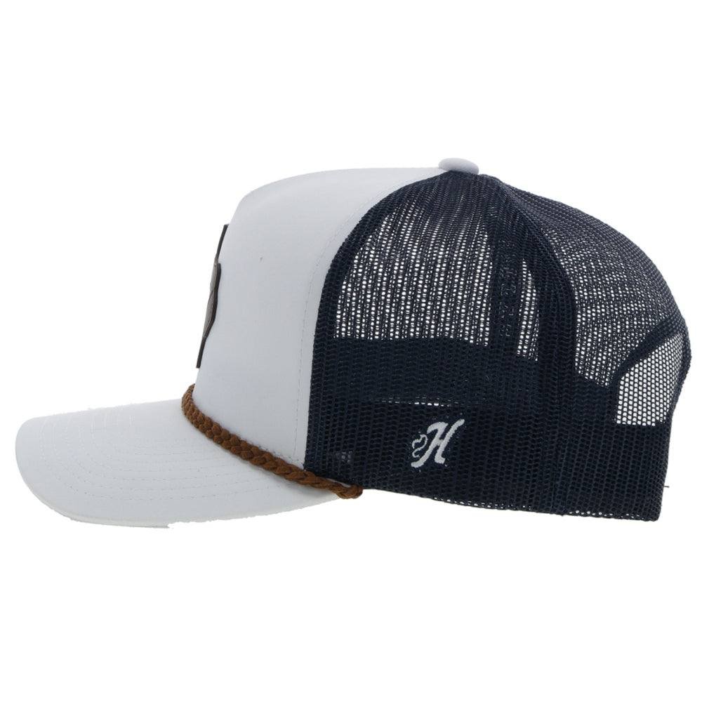 White and black mesh cap with brown strap on a white background