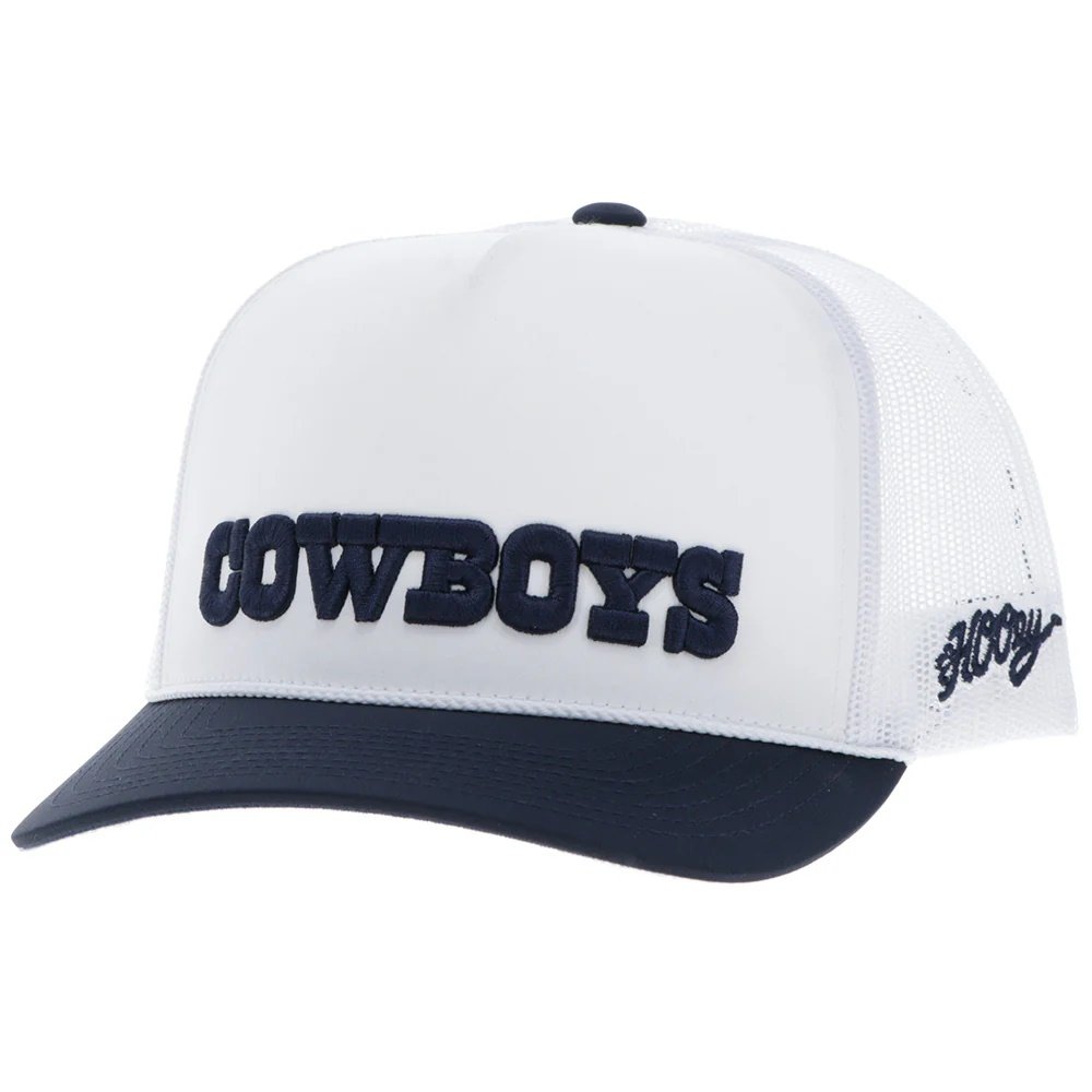 White and navy cap with 'COWBOYS' text on a white background