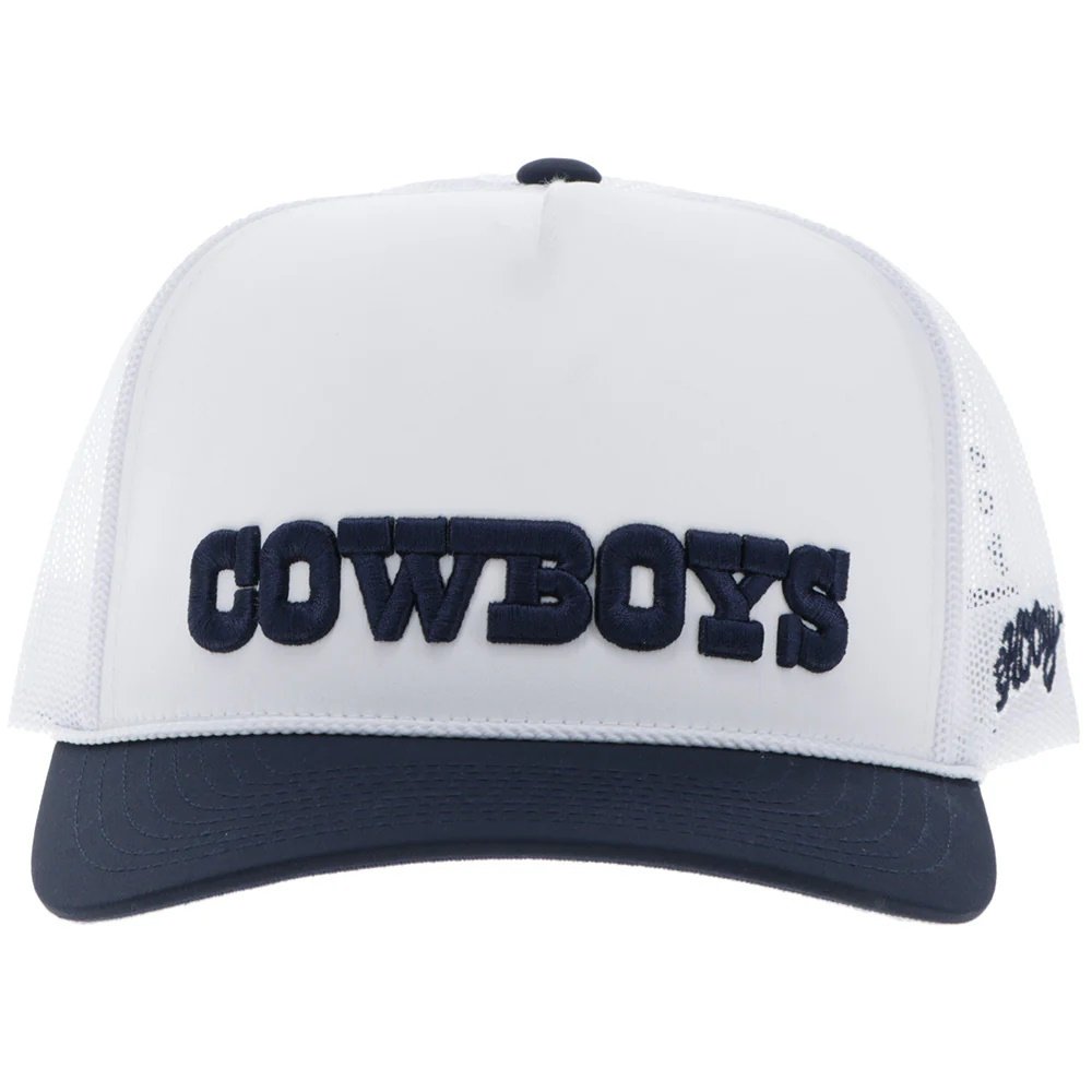 White and navy cap with 'COWBOYS' text on a white background