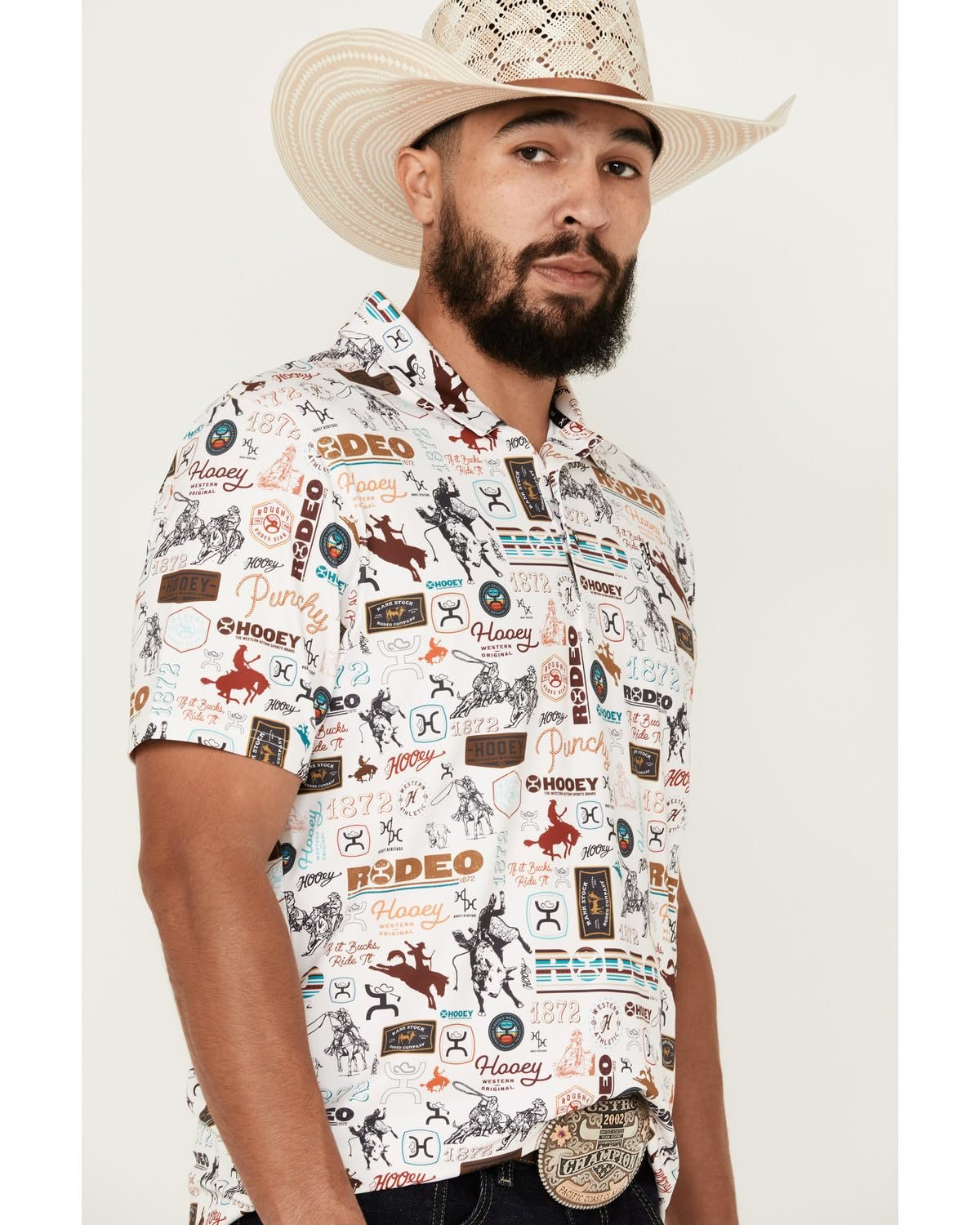 Man wearing a patterned shirt with cowboy hats and boots on a white background
