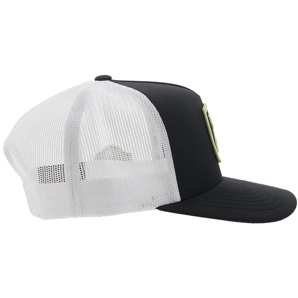 Black and white trucker cap with mesh back on a white background