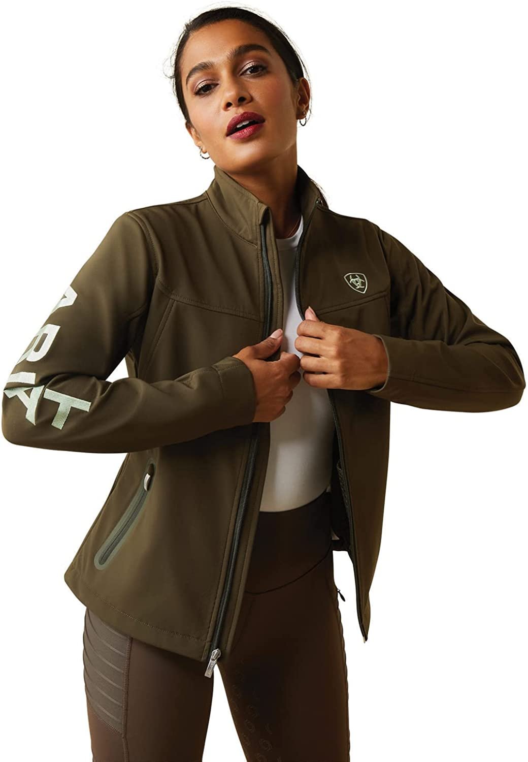 Woman Wearing Ariat Women's New Team Softshell Jacket in Relic Green