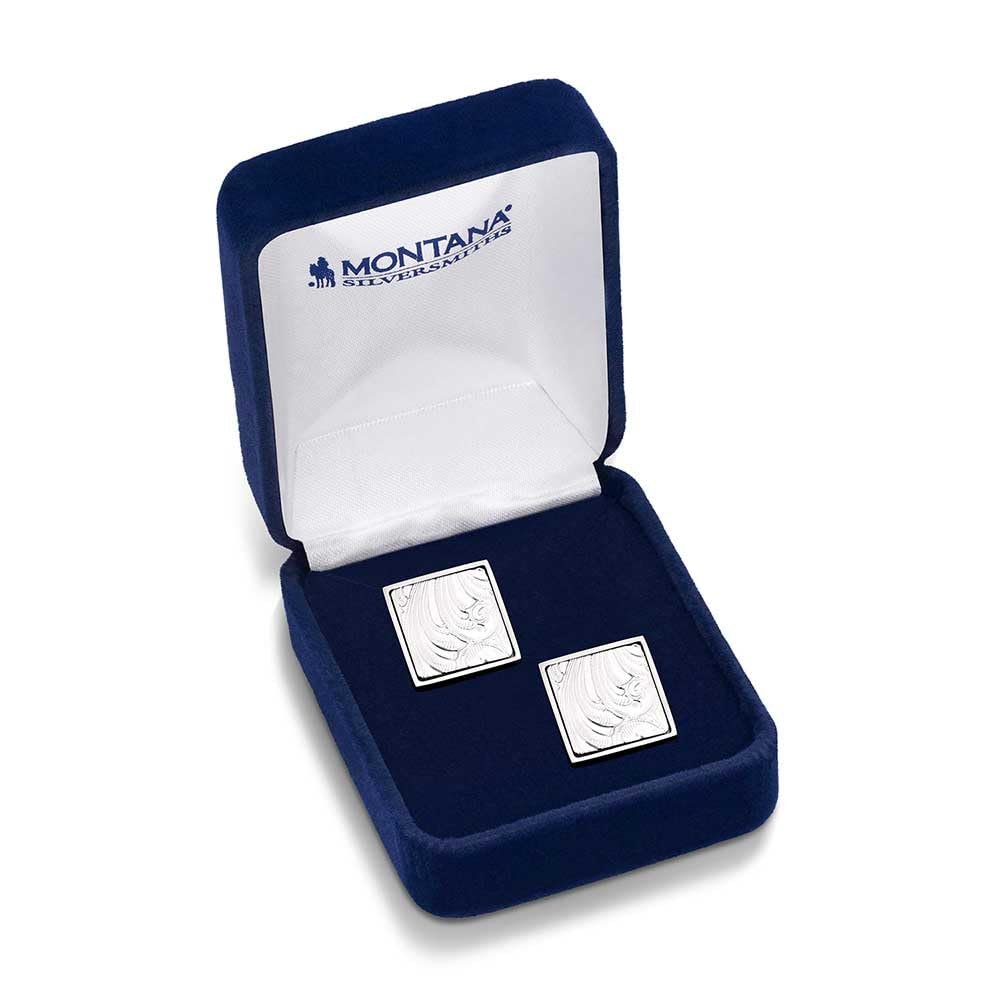 Classic Engraved Cuff Links displayed in a blue Montana Silversmiths gift box, ready for gifting.