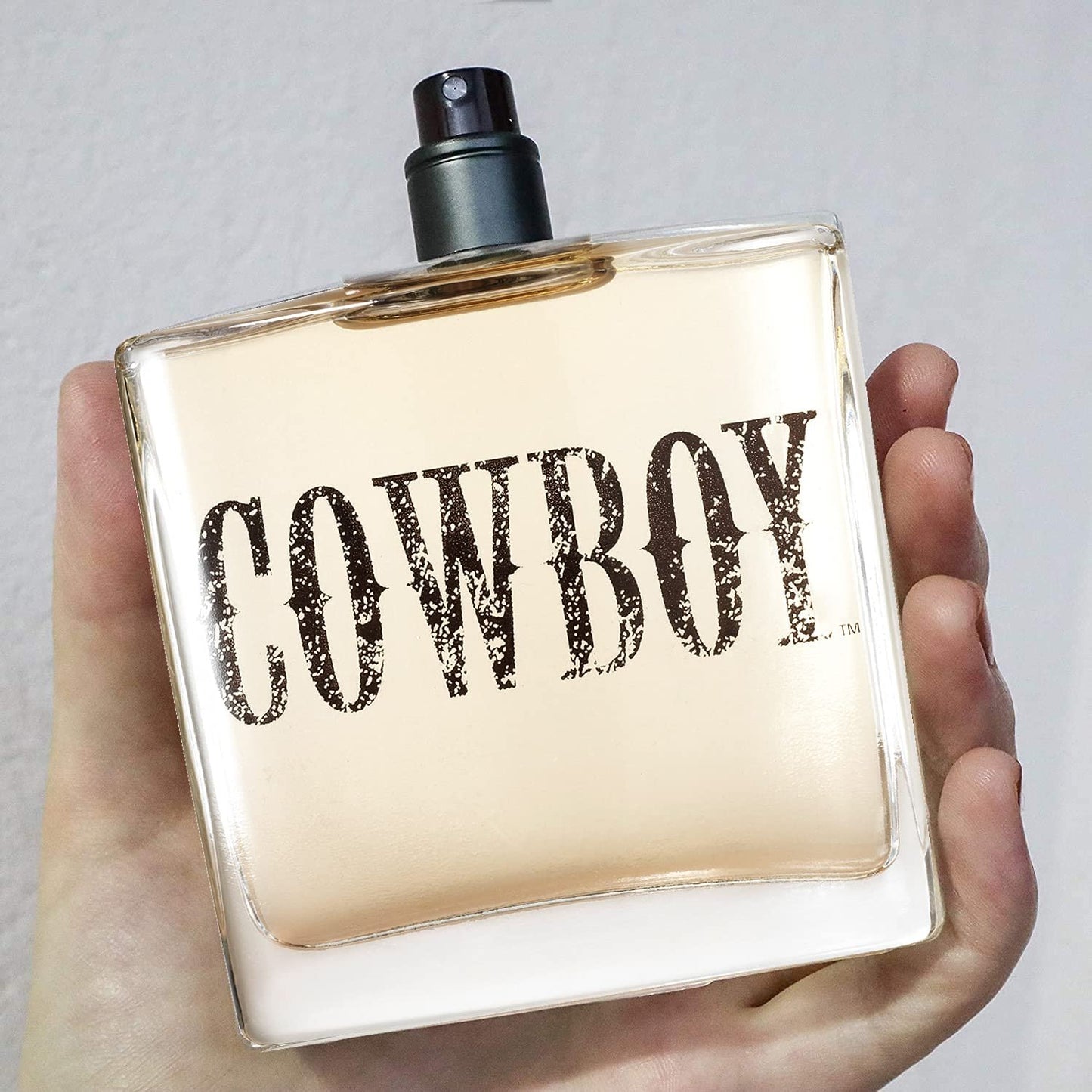 Hand Holding Tru Western Men's Cowboy Cologne
