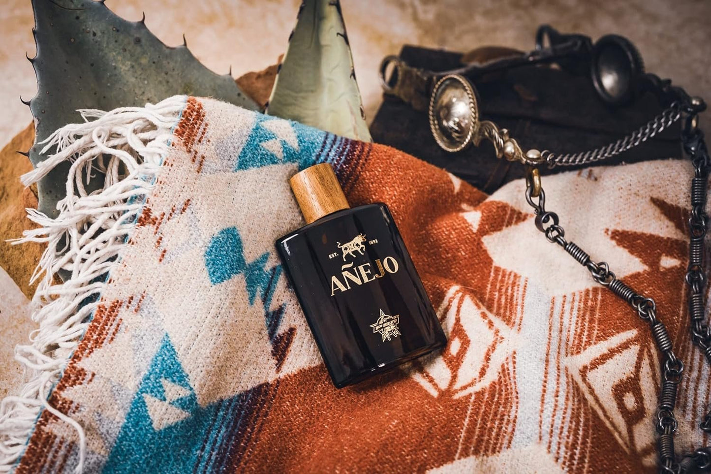 Bottle of Tru Western Men's PBR Añejo Cologne on Blanket