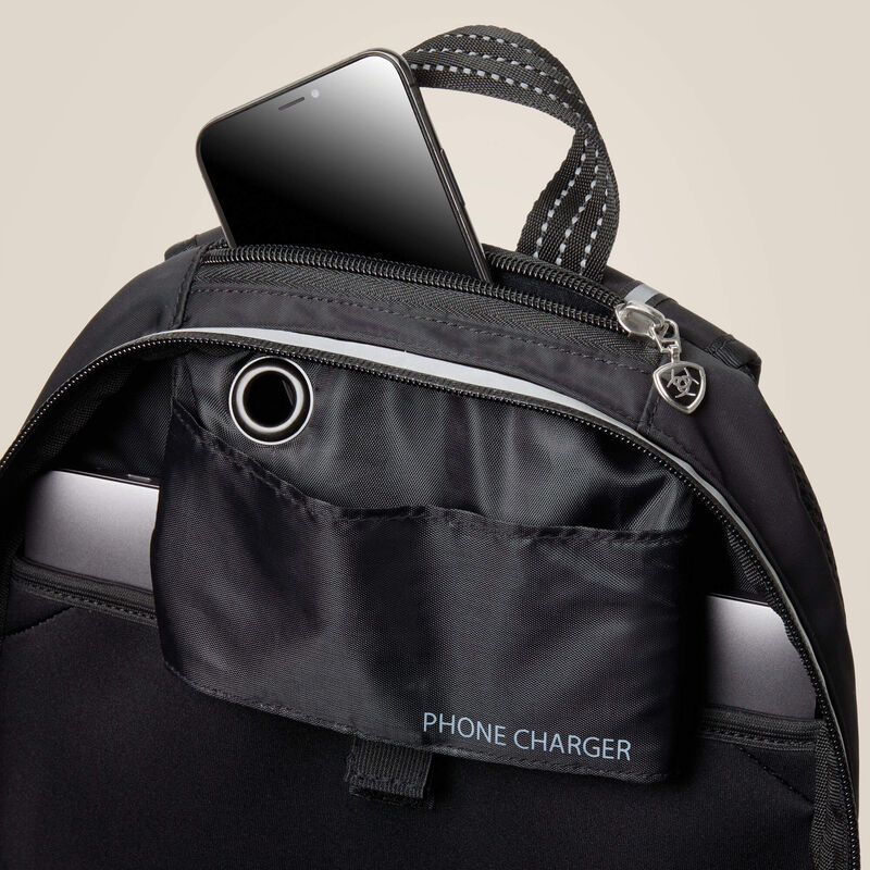Ariat Unisex Ring Backpack With Top Zipper Open, Holding Phone