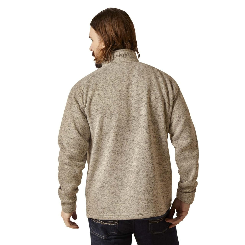 
                  
                    Man wearing a beige fleece jacket on a white background
                  
                