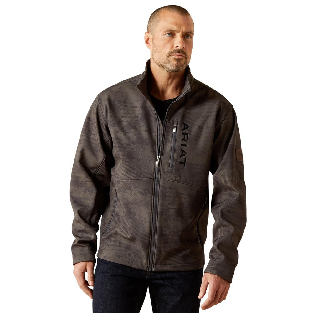 Man wearing a brown Ariat jacket on a white background