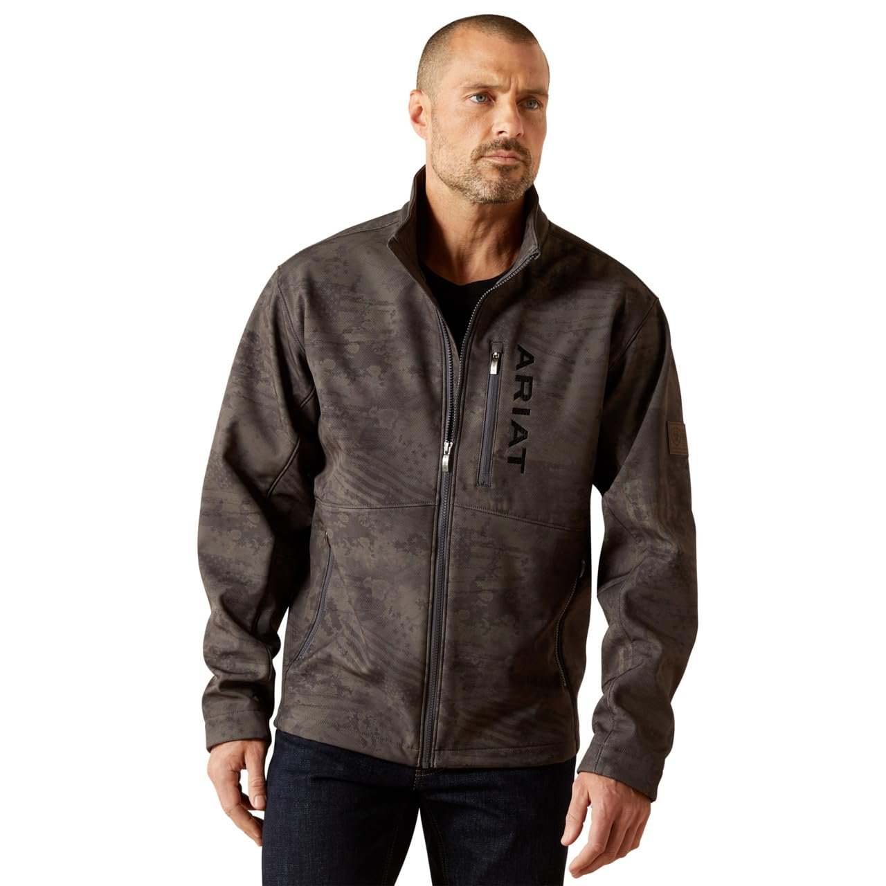 Man wearing a brown Ariat jacket on a white background