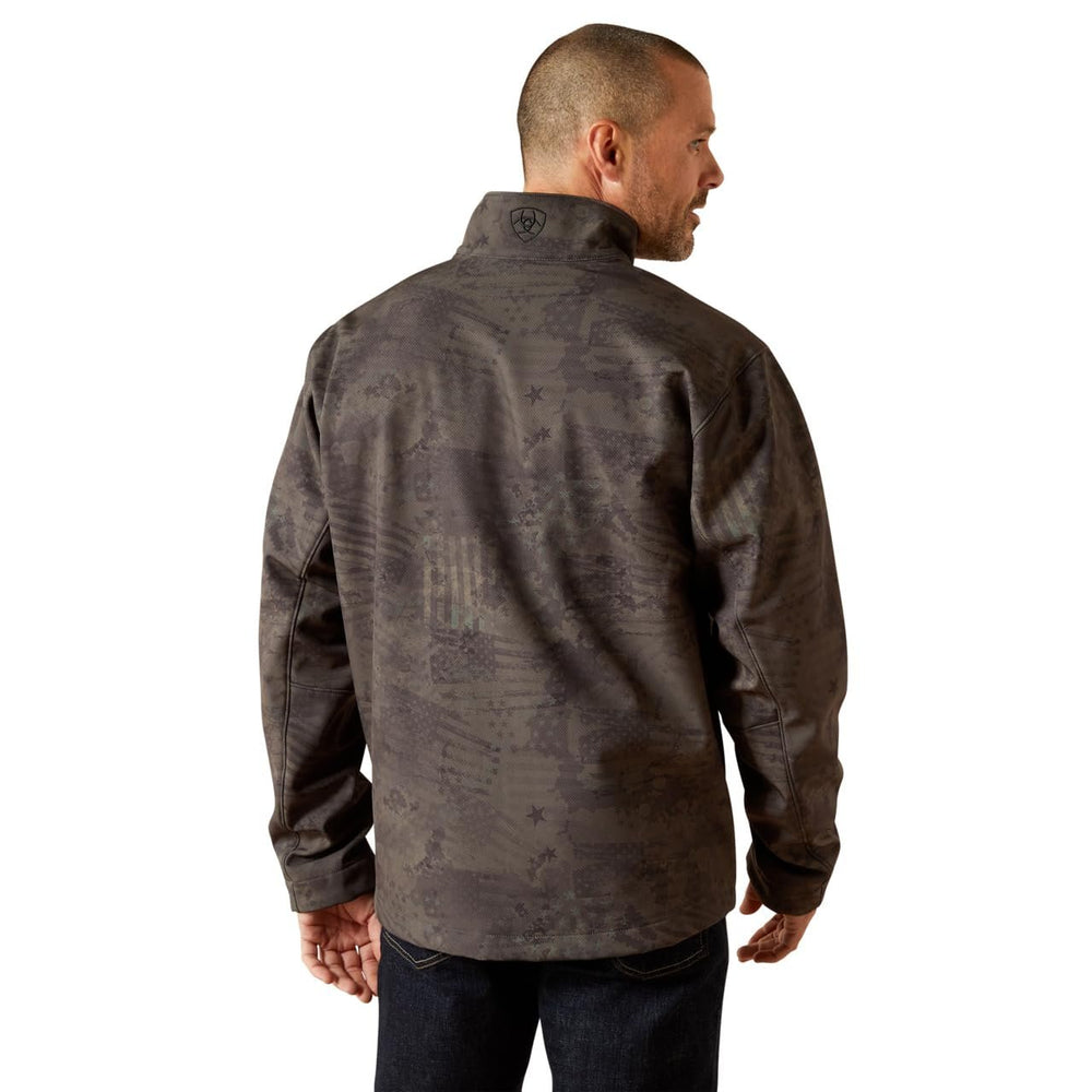 Man wearing a dark camouflage jacket on a white background