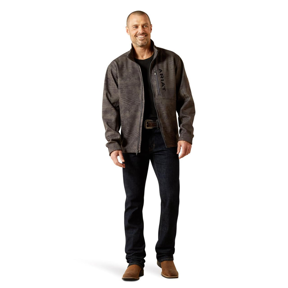 
                  
                    Man wearing a brown jacket with a visible brand logo on a white background
                  
                