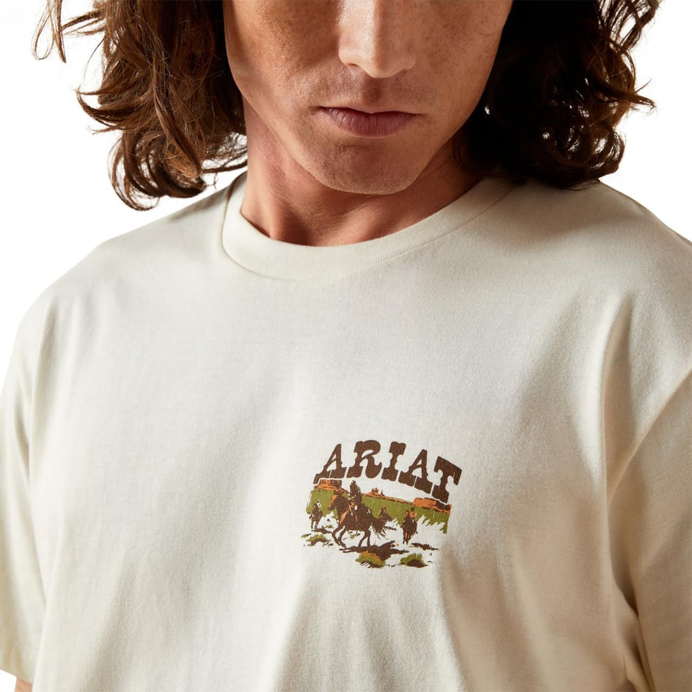 
                  
                    Person wearing a white t-shirt with an Ariat logo
                  
                