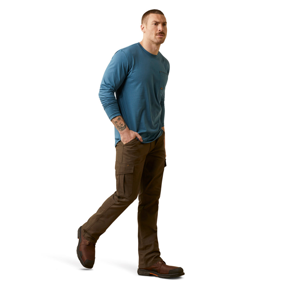 
                  
                    Man wearing a blue long-sleeve shirt and brown cargo pants on a white background
                  
                