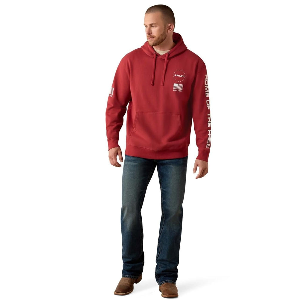 
                  
                    Man wearing a red hoodie with branding on a white background
                  
                