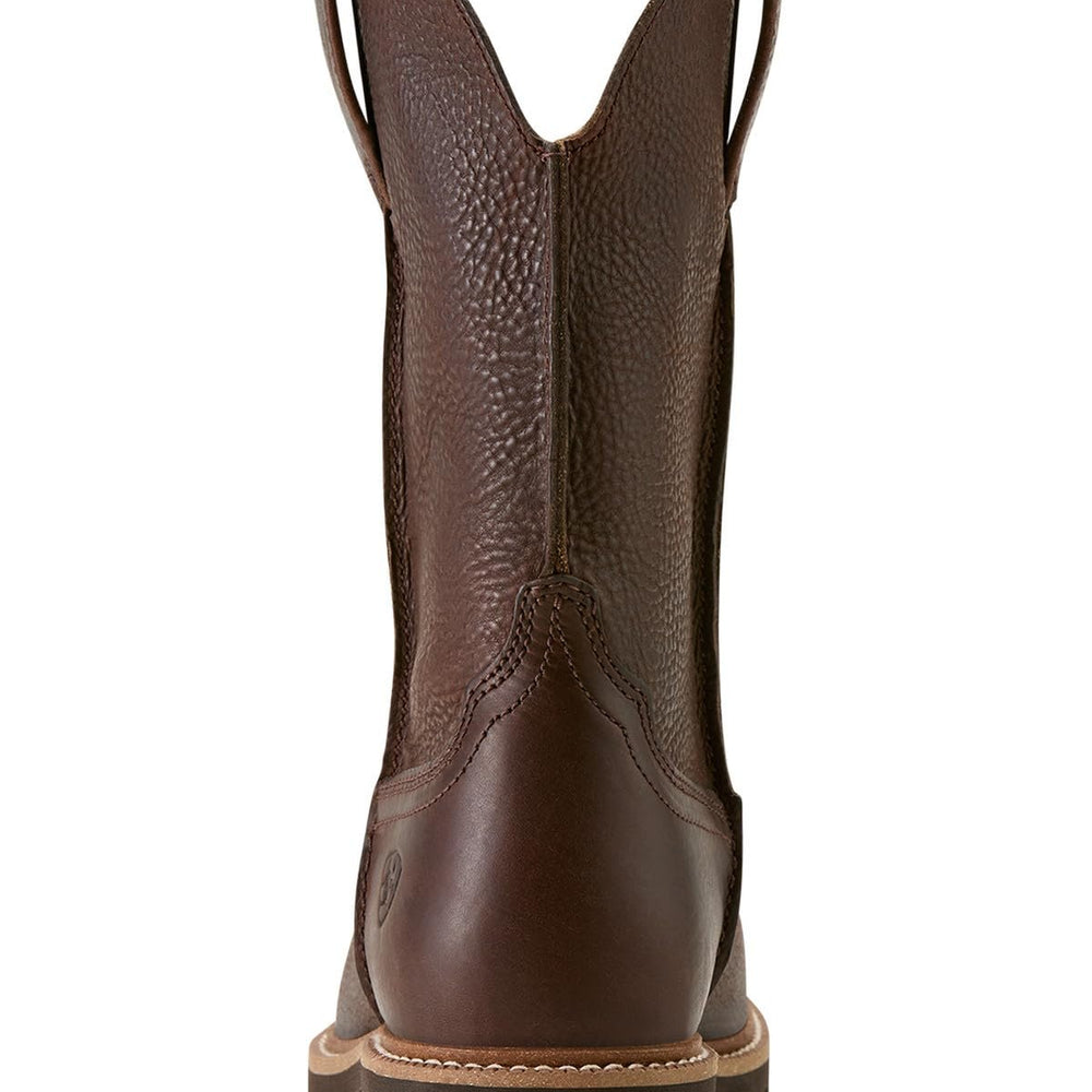 
                  
                    Brown cowboy boot on a white background
                  
                