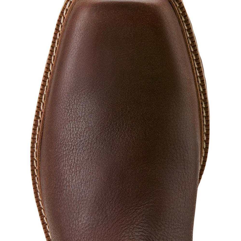 
                  
                    Close-up of a brown leather boot with a white background
                  
                