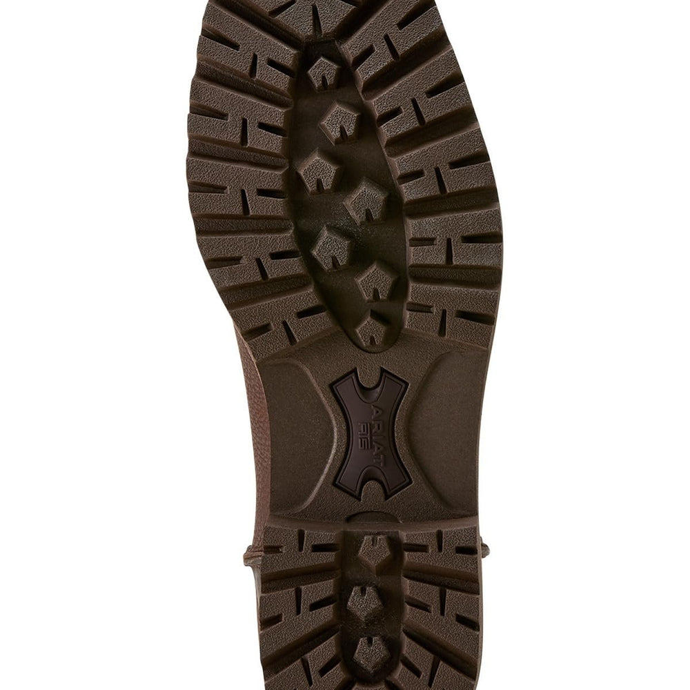 
                  
                    Close-up of a brown rubber sole on a white background
                  
                