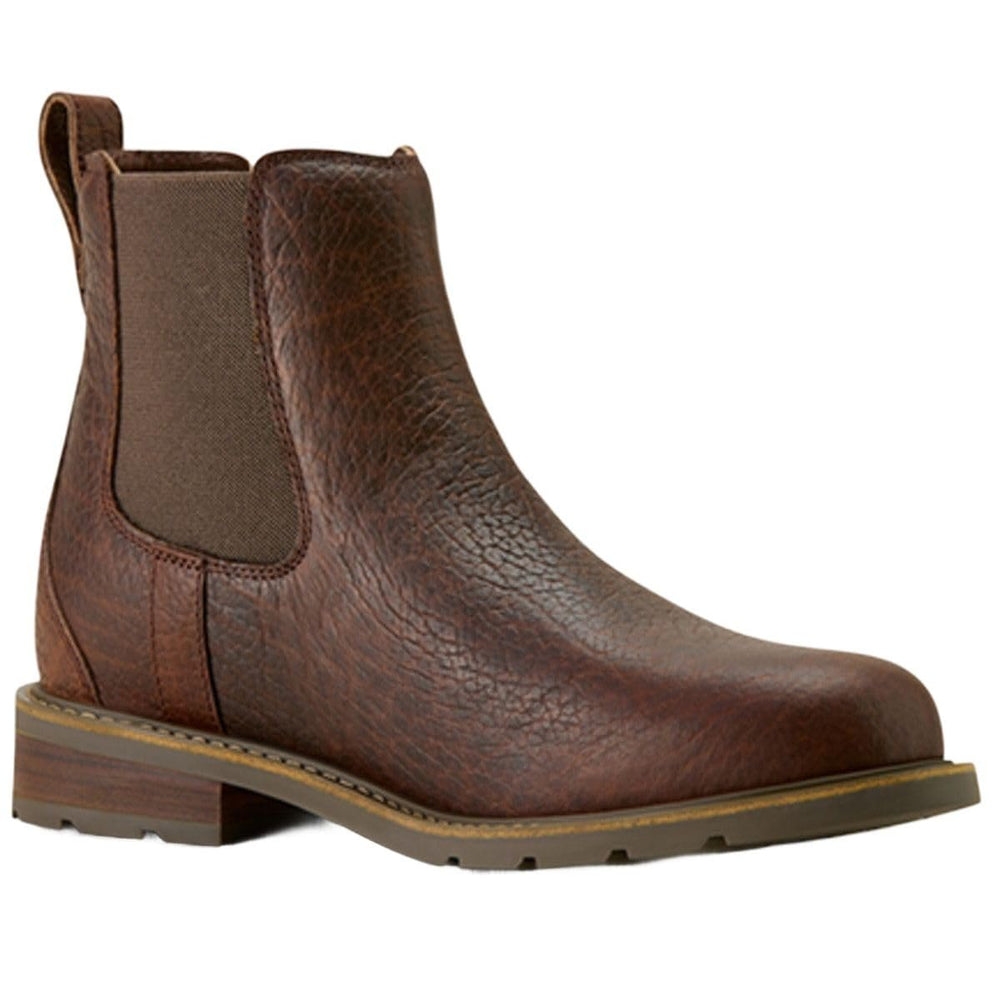 Brown leather boot on a white background