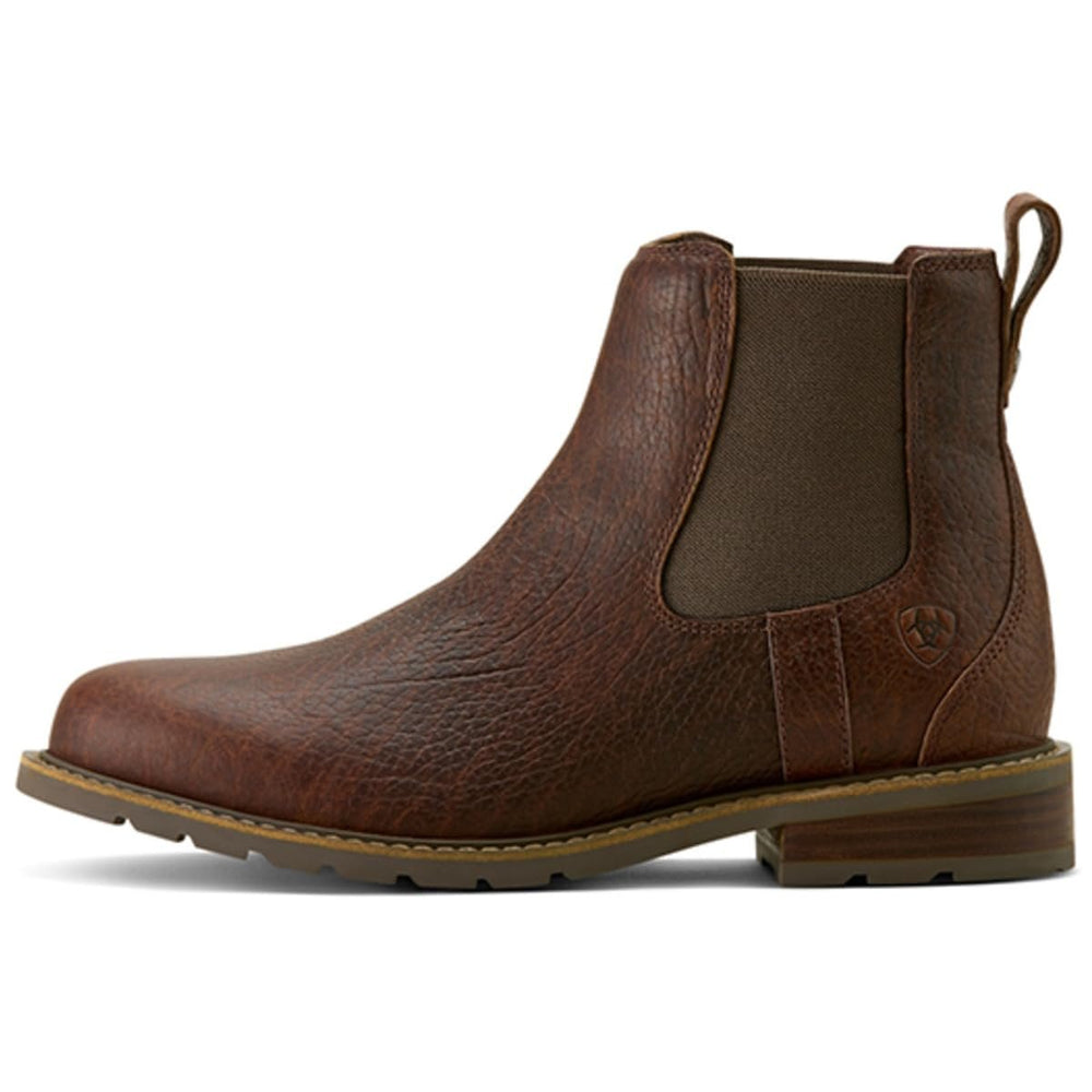 
                  
                    Brown leather boot on a white background
                  
                