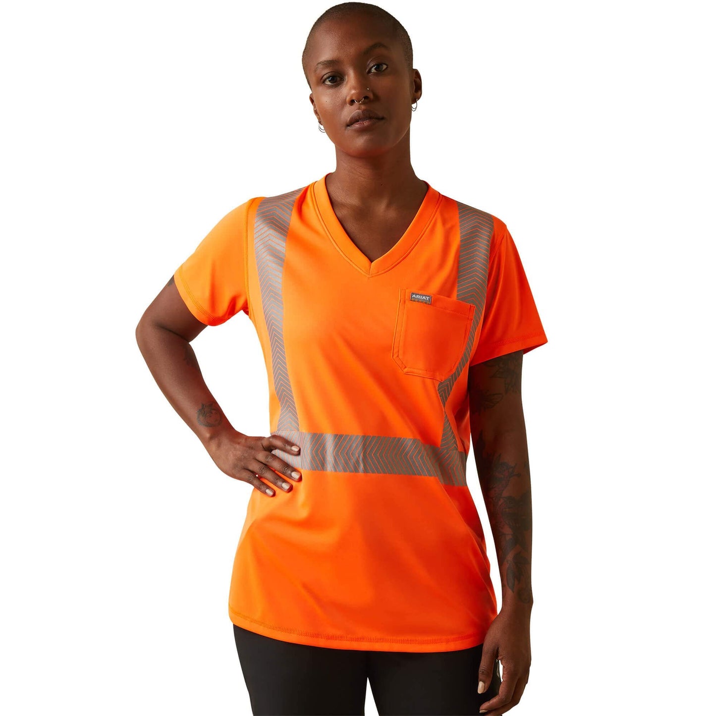 Person wearing an orange safety shirt with reflective stripes on a white background