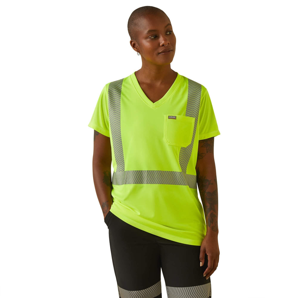 
                  
                    Person wearing a bright yellow safety vest with reflective stripes on a white background
                  
                
