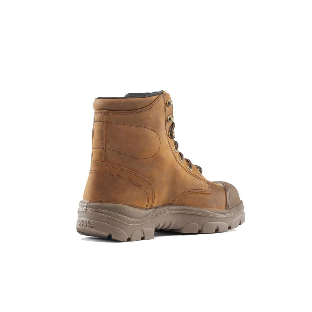 
                  
                    Brown leather boot on a white background
                  
                