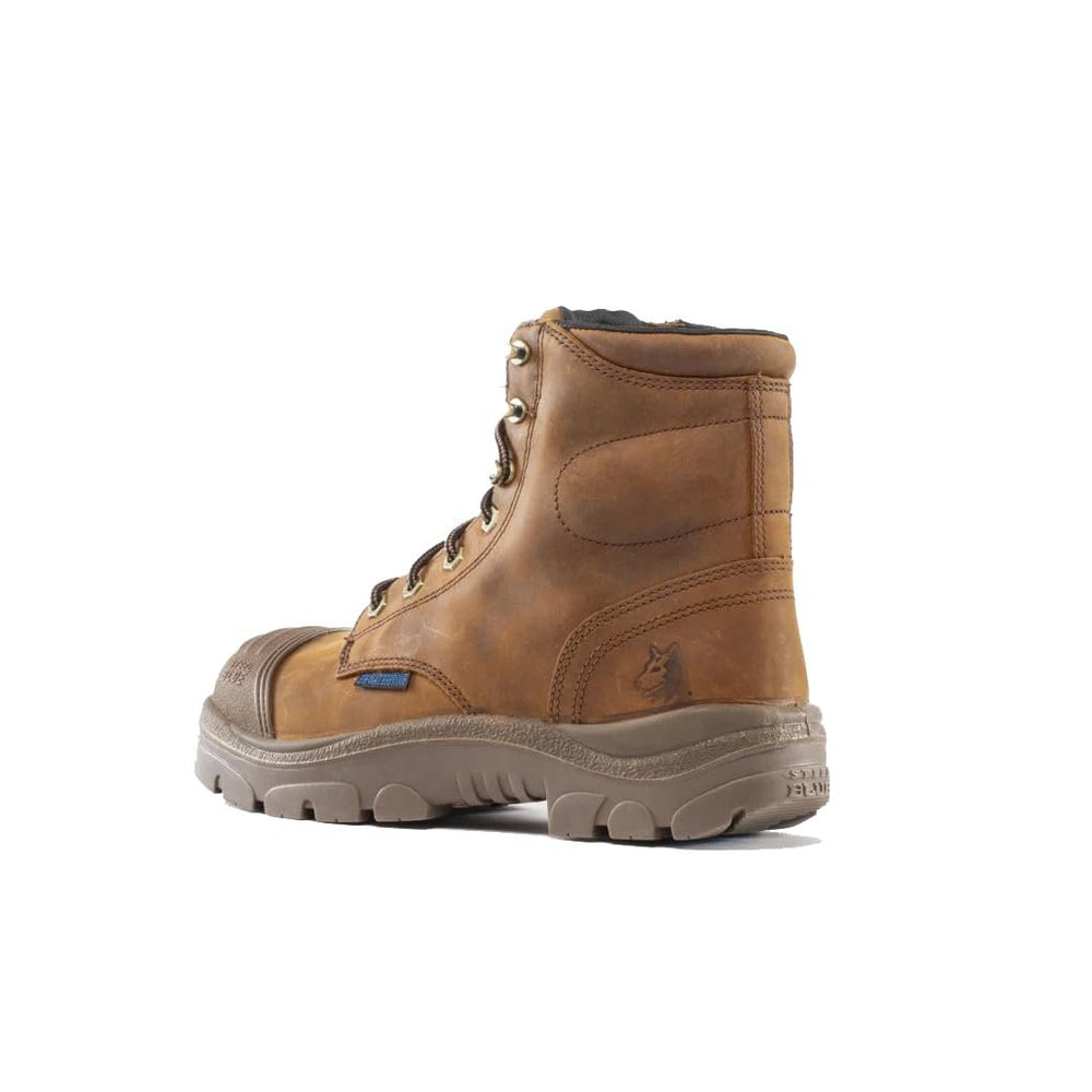 
                  
                    Brown leather boot on a white background
                  
                