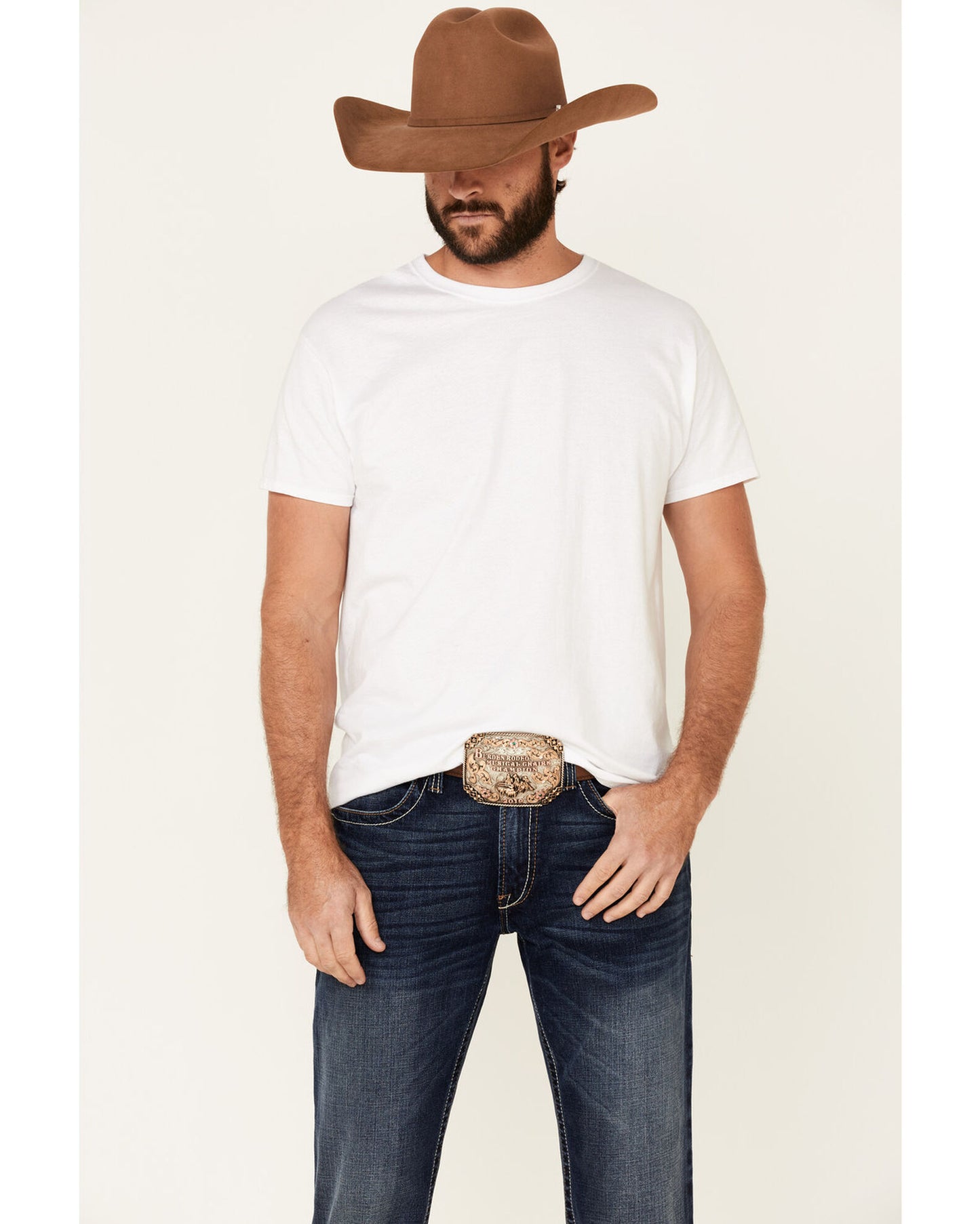 Man Wearing Ariat Men's M4 Denali Malone Dark Stretch Stackable Relaxed Straight Jeans