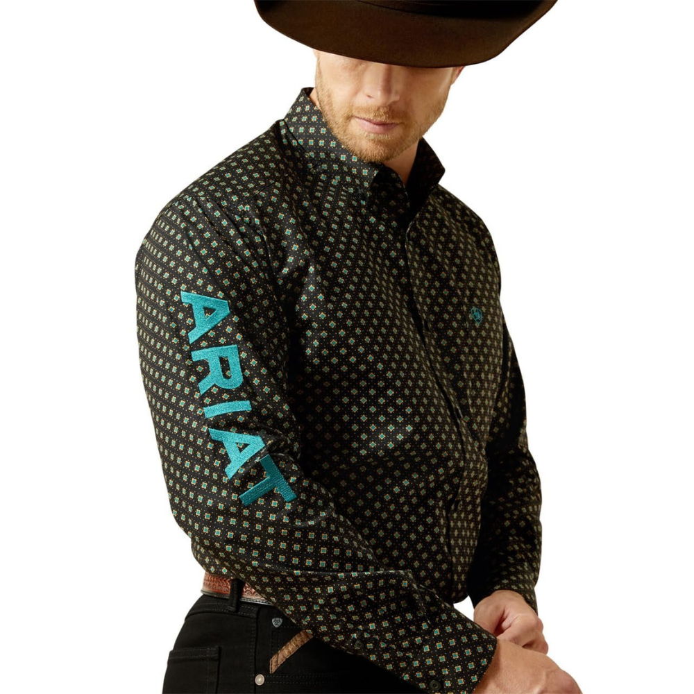 Man wearing Ariat Men's Team Philbert Classic Fit Shirt in Black/Teal
