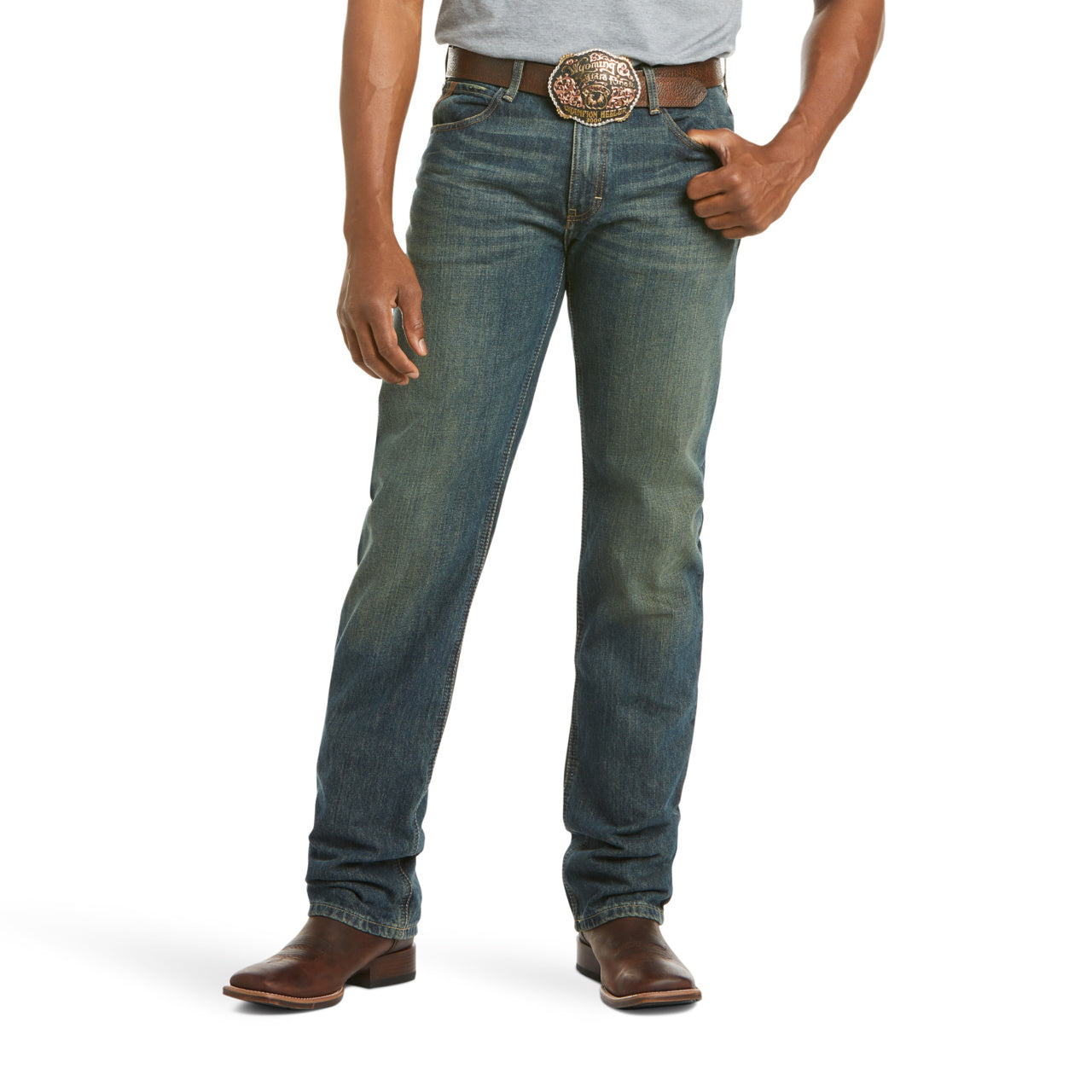 Person wearing blue jeans with a brown belt on a white background