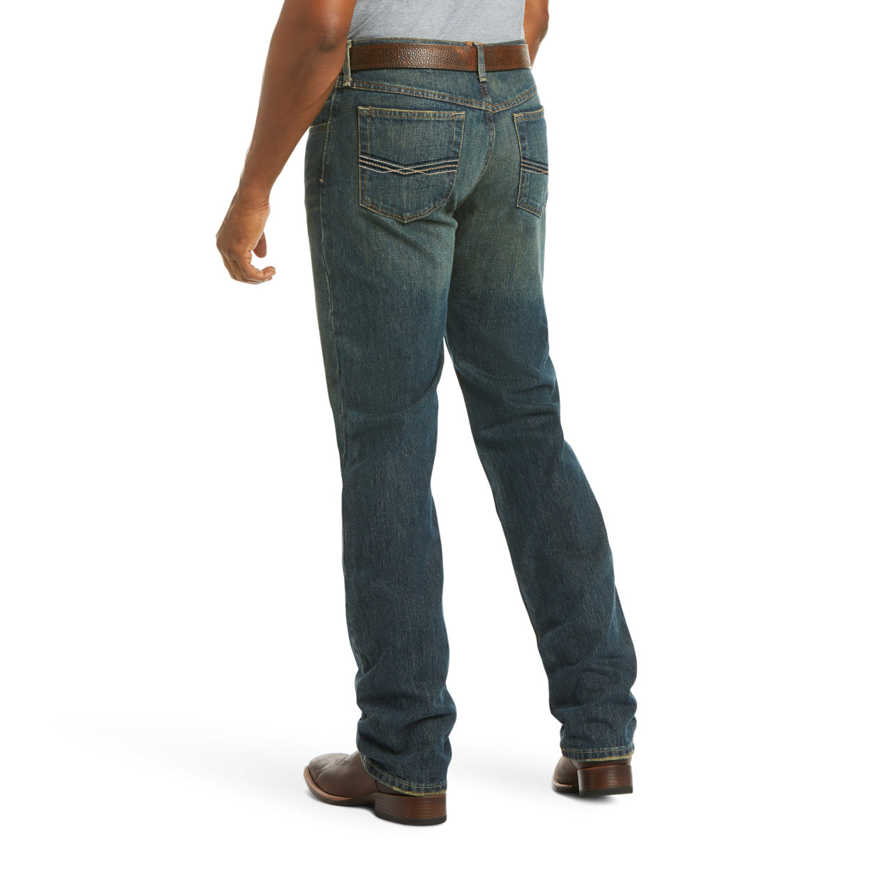 Blue jeans worn by a person on a white background