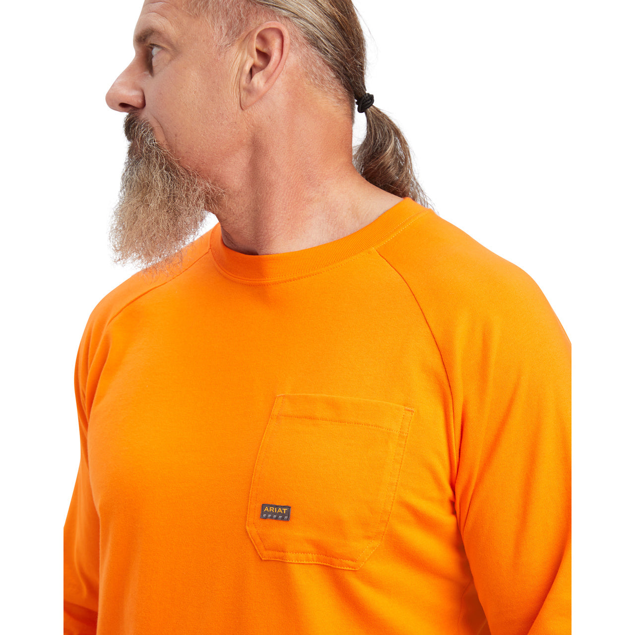 Man wearing an orange long-sleeve shirt on a white background