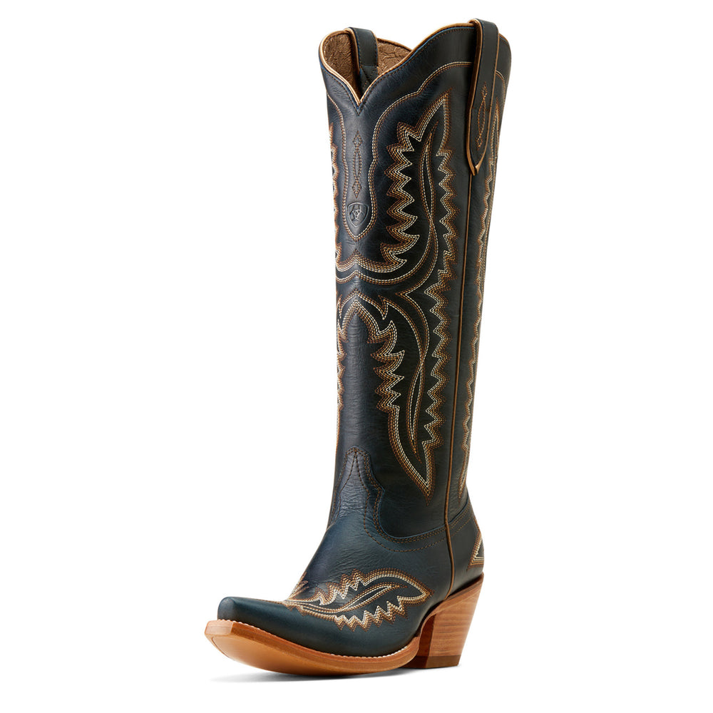 
                  
                    Black cowboy boot with brown leather stitching on a white background
                  
                