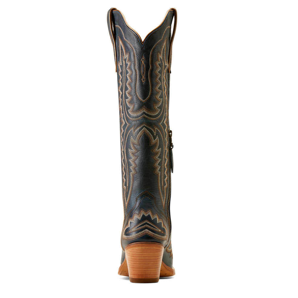 
                  
                    Black cowboy boot with intricate brown embroidery on a white background
                  
                