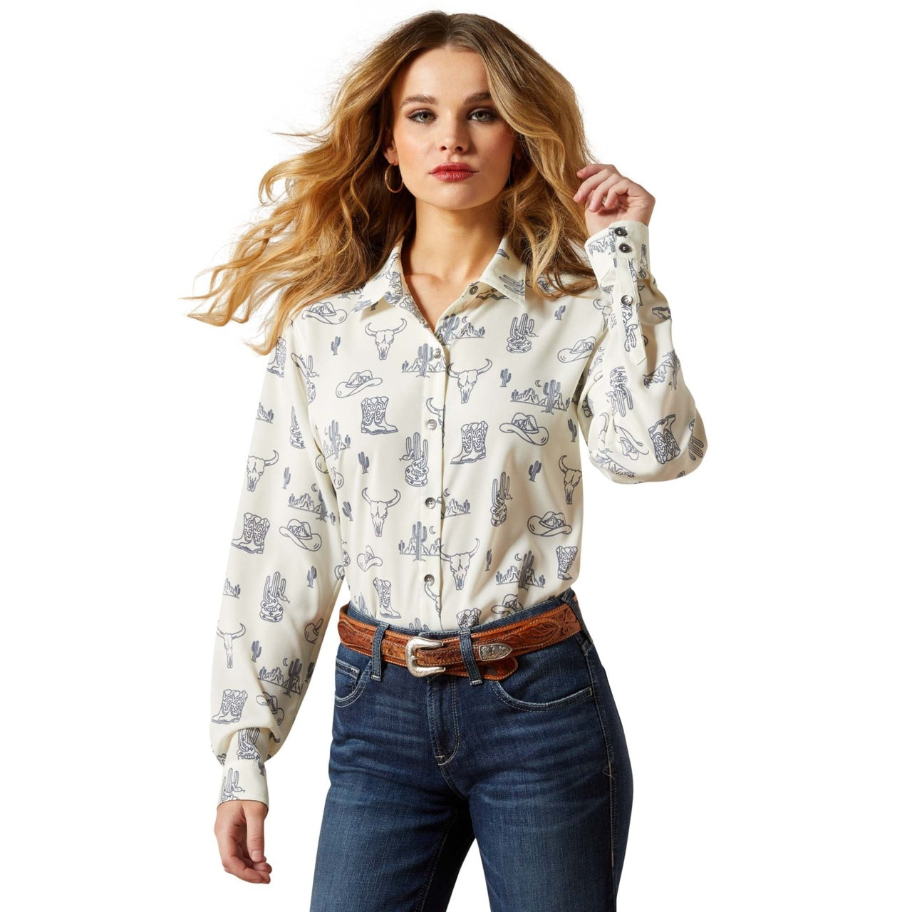 Woman wearing a patterned shirt and jeans on a white background