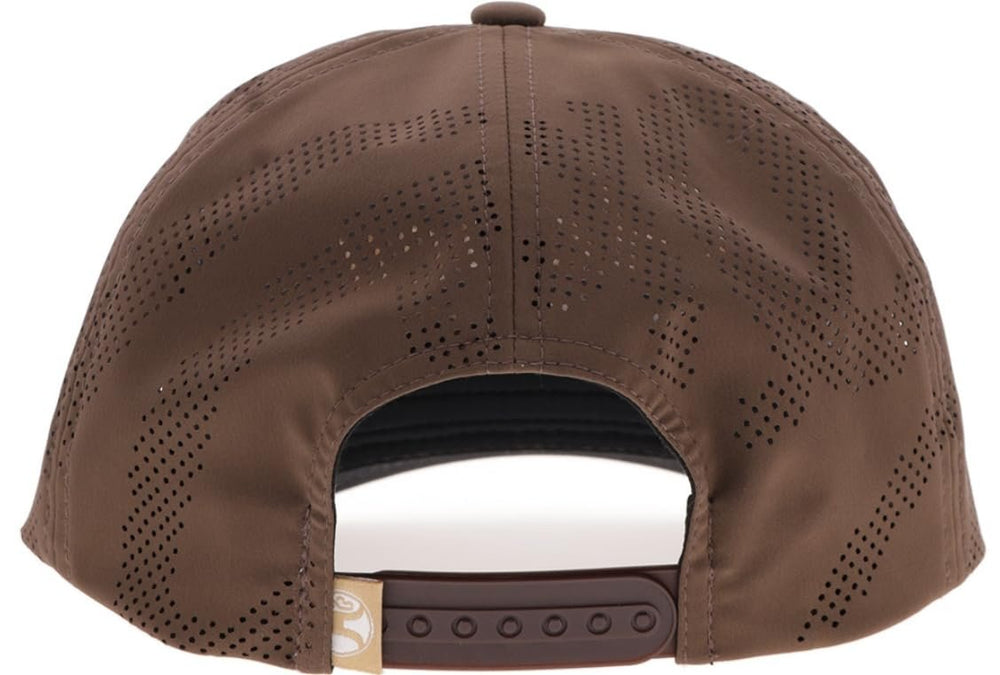 
                  
                    Brown baseball cap with a visible brand logo on the back against a white background
                  
                