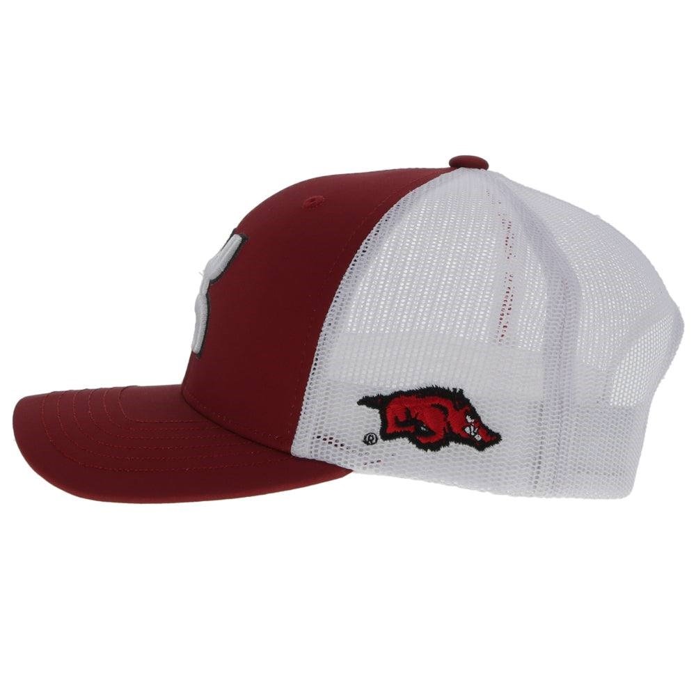 Red and white cap with a logo on a white background