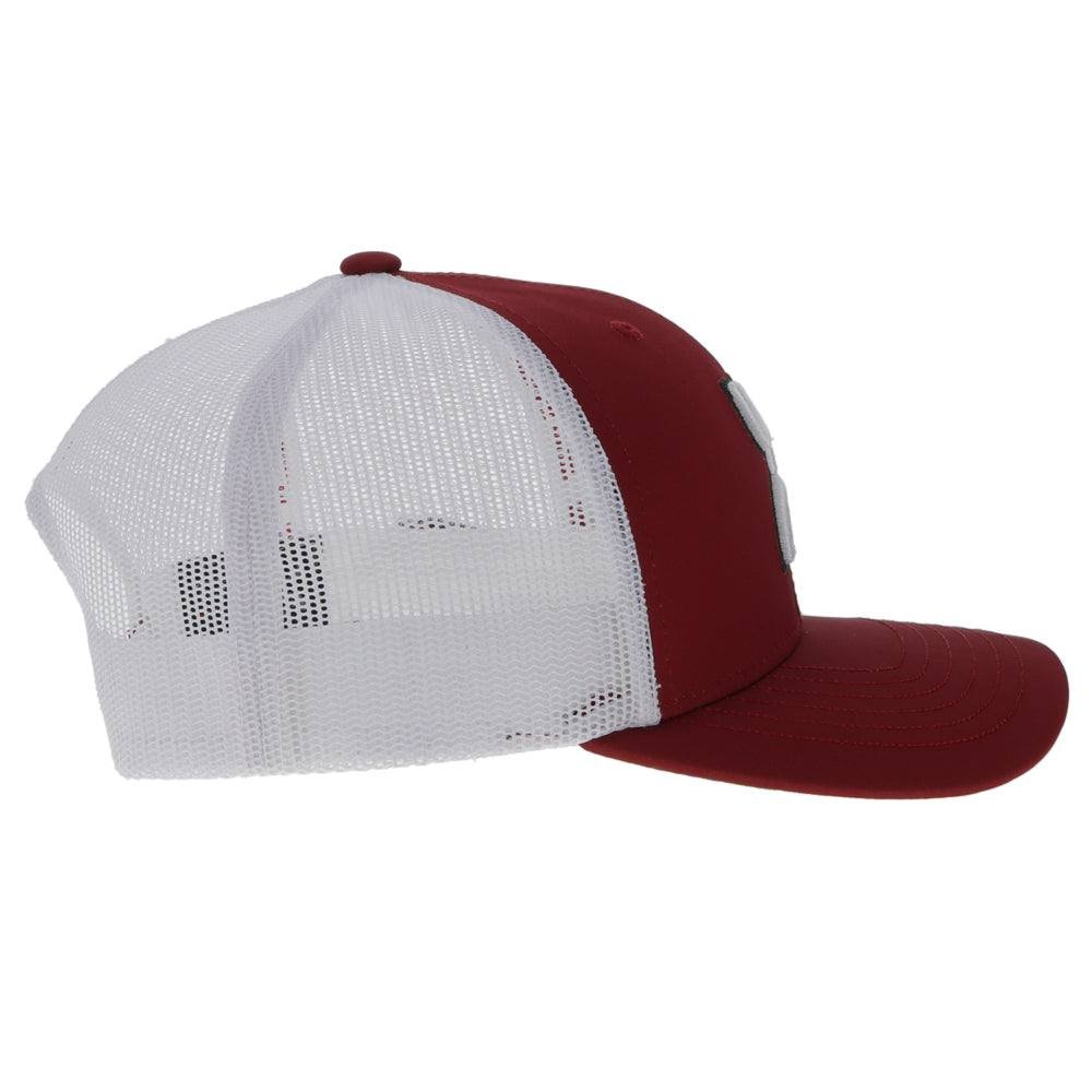 
                  
                    Red and white trucker cap on a white background
                  
                