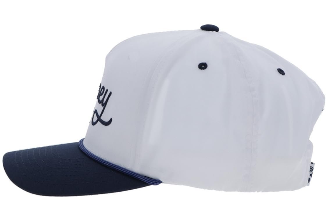 White and navy baseball cap with a logo on a white background