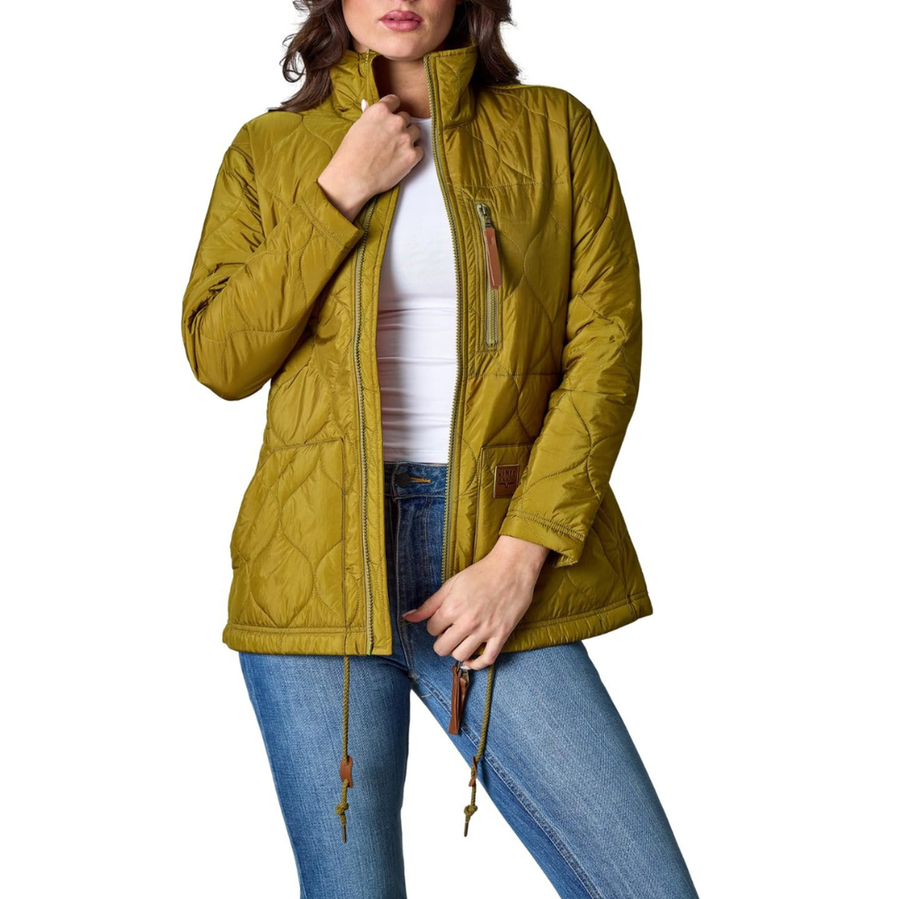 Woman wearing a mustard yellow quilted jacket on a white background
