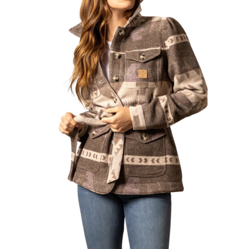 Person wearing a patterned jacket with a white background