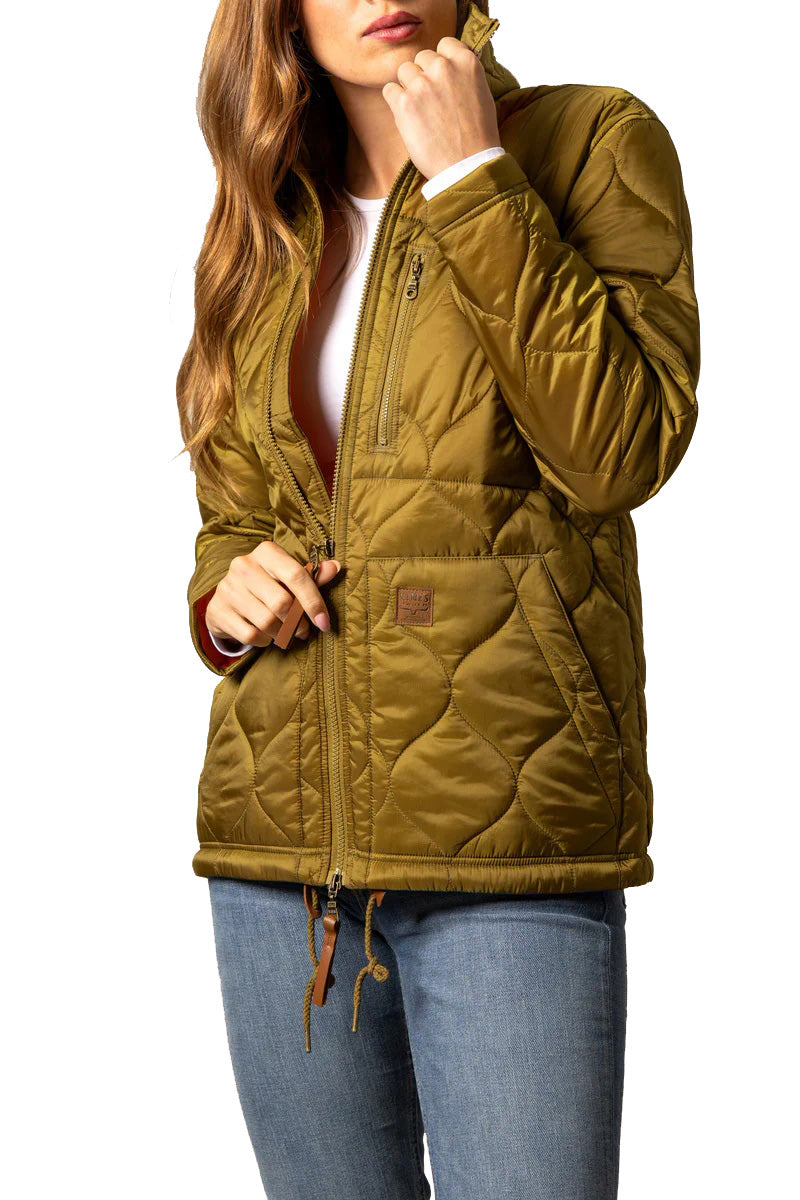 Person wearing a green quilted jacket with a white background