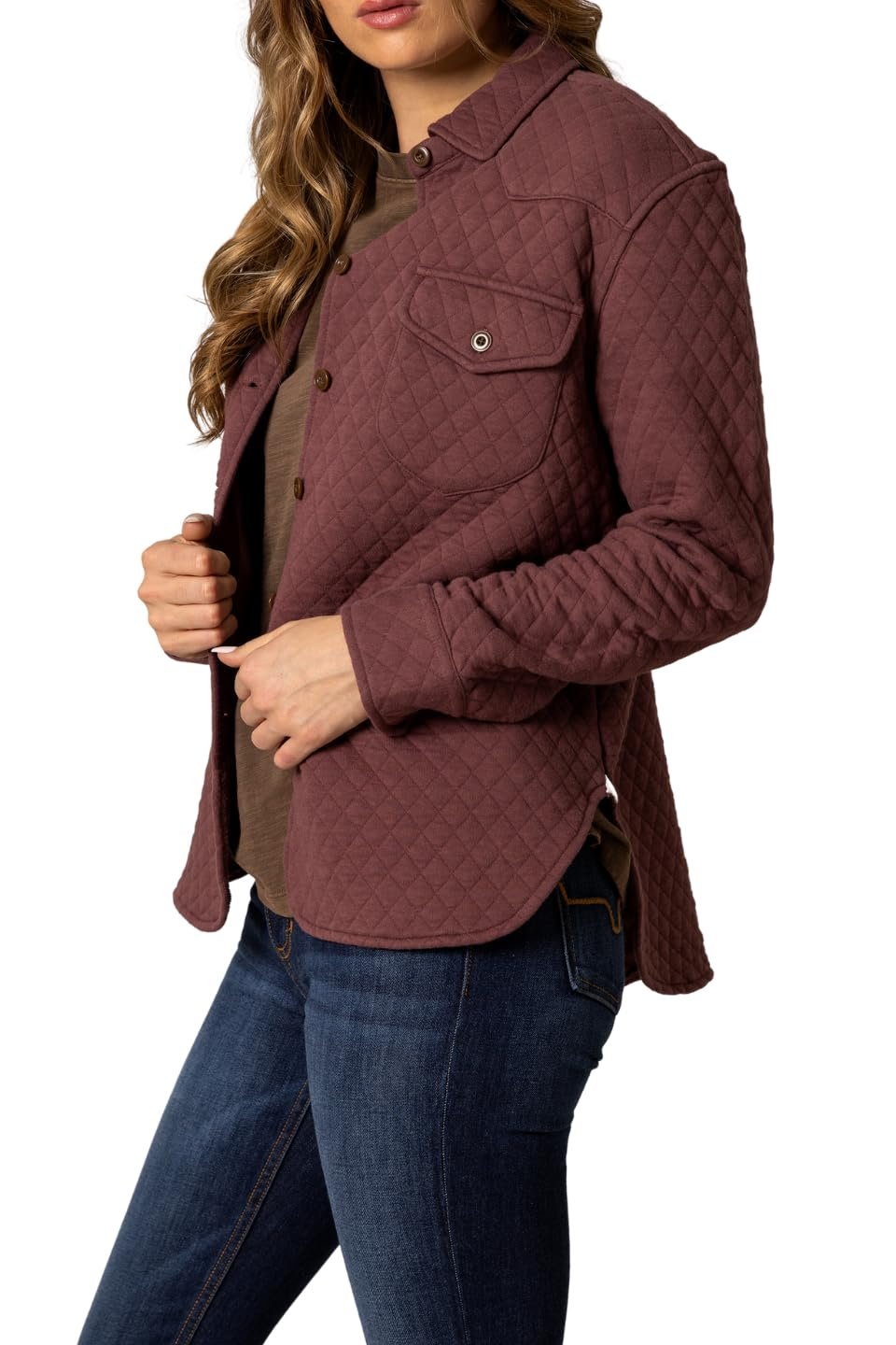 Quilted jacket worn by a person on a white background