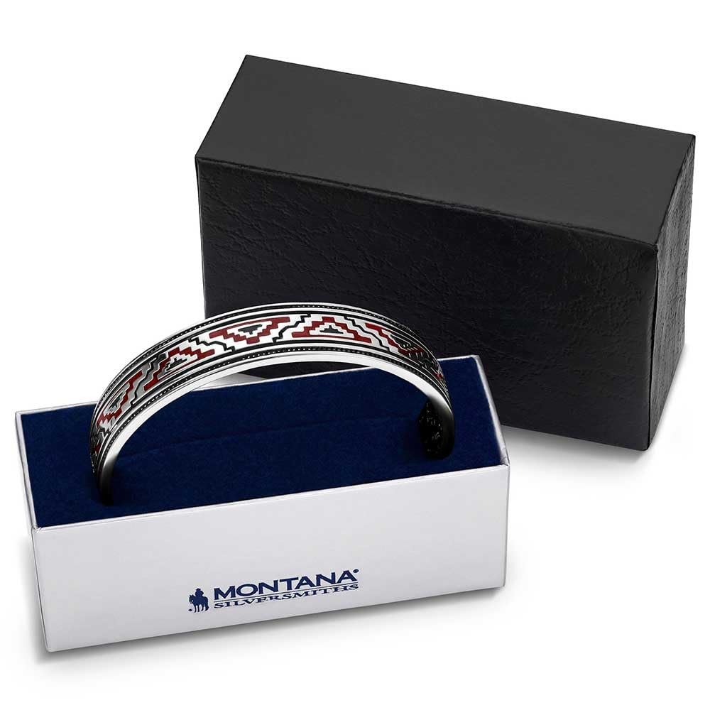 
                  
                    Silver bracelet with red and white pattern in a Montana Silversmiths box
                  
                