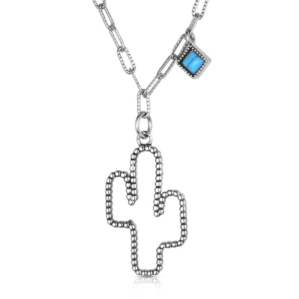 Silver cactus-shaped pendant on a chain with a blue gemstone against a white background
