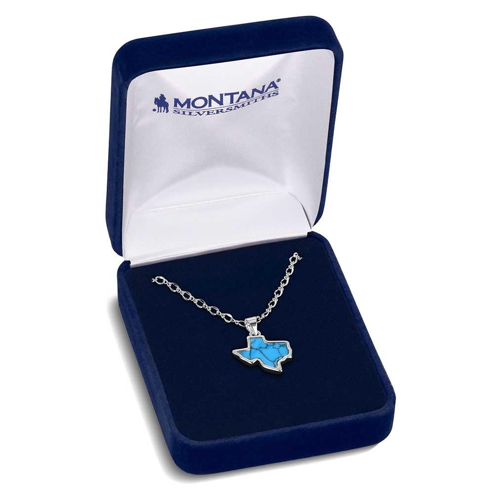 
                  
                    Blue stone Texas-shaped pendant necklace in a Montana Silversmiths box
                  
                
