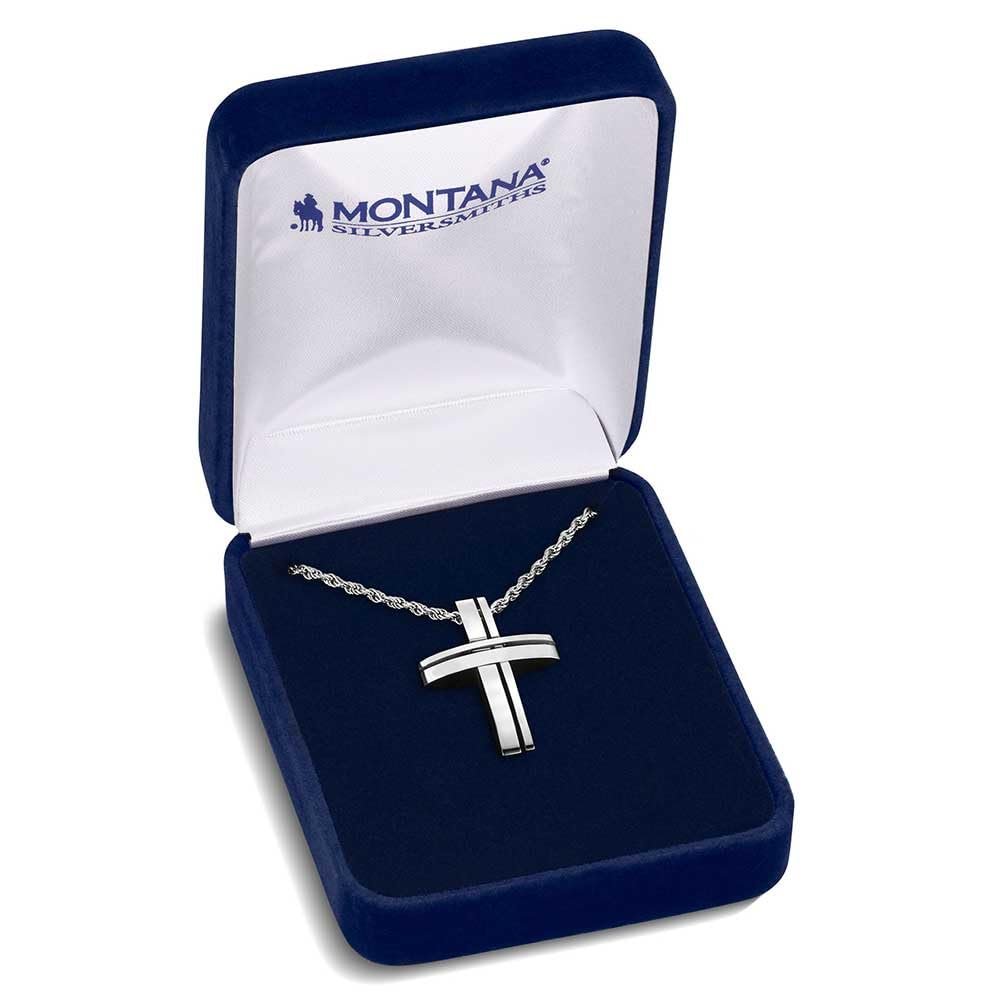 
                  
                    Silver cross necklace in a Montana Silversmiths box on a white background
                  
                