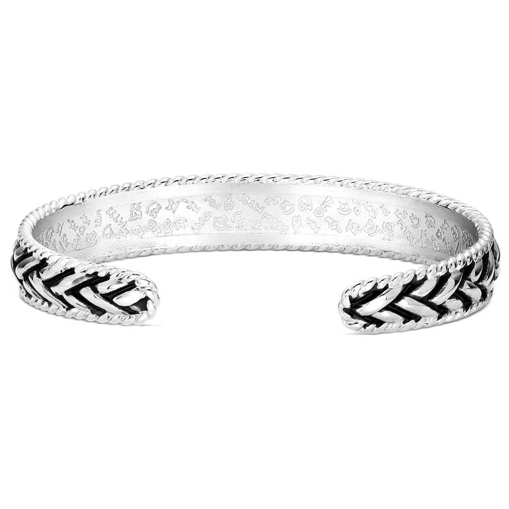 
                  
                    Silver bracelet with a chevron pattern on a white background
                  
                